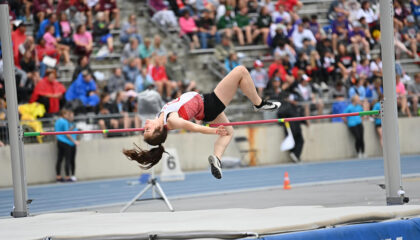 RIver Hamaker high jumping at the state tournament.