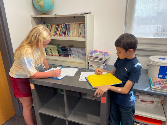 Two fourth grade students practice their rocket math