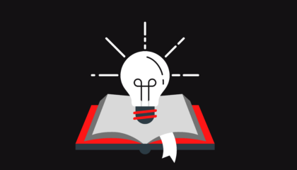 clipart: white lightbulb shines above an open book