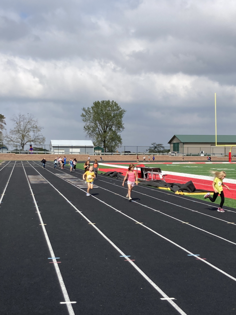 CD students walk around the track during the healthy walk.
