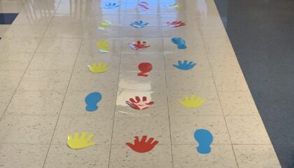hand and footbprints create a sensory pathway in the hall at South Elementary