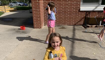 Two South Elementary Students enjoy a lemonade recess to celebrate RED Way behavior