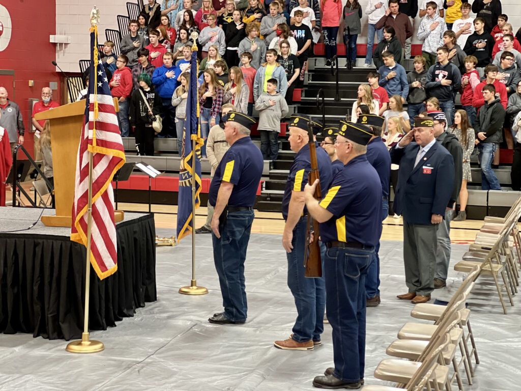 Local VFW members present the colors before the assembly. 