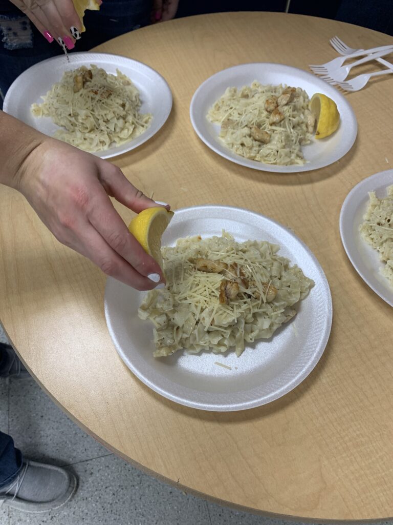 Fresh pasta and homemade sauce prepared by high school culinary students.