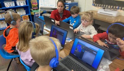 Kindergarteners code a character during the Hour of Code