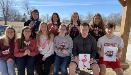 Spanish IV students posed with their class projects.